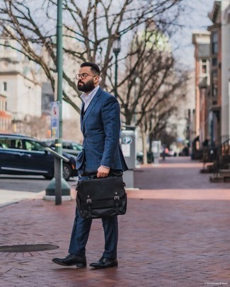Briefcase Outfits: For something on the casually cool end, try pairing a navy check suit with a briefcase. Black leather oxford shoes are a guaranteed way to inject a touch of class into this ensemble.