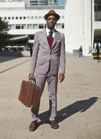 Dark Brown Suitcase Outfits For Men: If you're hunting for a casual yet seriously stylish look, make a grey suit and a dark brown suitcase your outfit choice.
