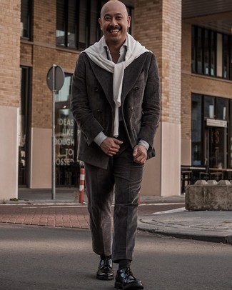 White Crew-neck Sweater Dressy Outfits For Men: Irrefutable proof that a white crew-neck sweater and a charcoal suit look awesome when worn together in a classy ensemble for today's gent. Black leather derby shoes will tie this full ensemble together.