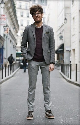 Charcoal Suit Smart Casual Outfits: Try teaming a charcoal suit with a dark purple crew-neck sweater for a classic and classy silhouette. And if you want to immediately play down this ensemble with a pair of shoes, why not complete this outfit with a pair of dark brown leather casual boots?