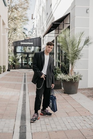 Navy Print Canvas Tote Bag Outfits For Men: This laid-back combo of a black suit and a navy print canvas tote bag is a solid bet when you need to look great in a flash. And if you want to instantly play down your look with one item, why not complete your getup with charcoal athletic shoes?