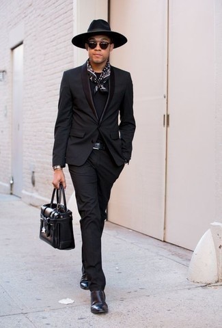 Black and White Bandana Outfits For Men: This pairing of a black suit and a black and white bandana is extra versatile and provides a neat and relaxed look. And if you wish to effortlessly elevate your outfit with a pair of shoes, grab a pair of black leather chelsea boots.