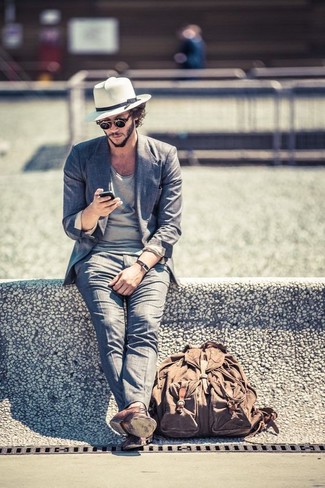Beige Hat Outfits For Men: If you're on the lookout for a relaxed casual but also on-trend ensemble, try teaming a grey suit with a beige hat. Channel your inner Idris Elba and complete your getup with brown leather derby shoes.