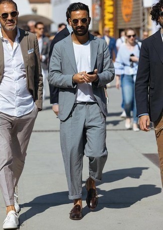 White Crew-neck T-shirt with Monks Outfits In Their 30s: Consider teaming a white crew-neck t-shirt with a grey suit to don a sleek and polished look. Let your styling credentials really shine by complementing this look with monks. So if you need fashion tips on what to wear as you pass the big three-oh, this getup is a great example.