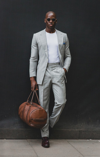 Burgundy Leather Double Monks Outfits: This combination of a grey check suit and a white crew-neck t-shirt is super versatile and provides instant elegance. You can get a little creative when it comes to shoes and class up this outfit by slipping into burgundy leather double monks.