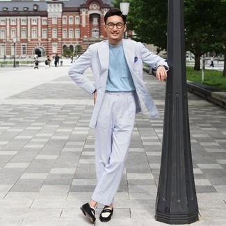 Light Blue Suit Outfits: Flaunt your styling game by marrying a light blue suit and a light blue crew-neck t-shirt. Complement this ensemble with black suede loafers for an added dose of polish.
