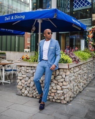 Light Blue Suit Outfits: This combination of a light blue suit and a white crew-neck t-shirt is a safe option when you need to look dapper but have no extra time. Turn up the formality of your ensemble a bit by finishing with a pair of navy suede loafers.