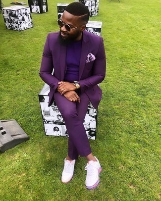Purple Pocket Square Outfits: For a winning casual option, you can rely on this combo of a violet suit and a purple pocket square. Complement this getup with white leather low top sneakers and the whole ensemble will come together.
