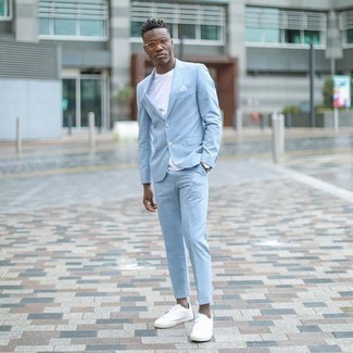 White Pocket Square Smart Casual Outfits: Go for a straightforward but at the same time cool and relaxed choice pairing a light blue suit and a white pocket square. A pair of white canvas low top sneakers will be a welcome addition to this getup.