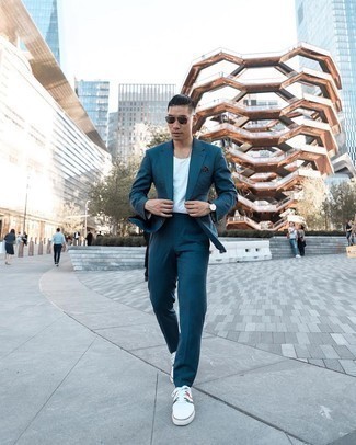 Navy and White Polka Dot Pocket Square Outfits: For a laid-back and cool outfit, consider teaming a teal suit with a navy and white polka dot pocket square — these two pieces go wonderfully together. A good pair of white print canvas low top sneakers pulls this look together.