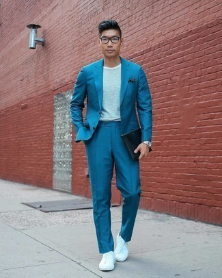 Light Blue Suit Outfits: This combo of a light blue suit and a white and navy horizontal striped crew-neck t-shirt is a real lifesaver when you need to look effortlessly smart but have no extra time. For a more casual touch, add white canvas low top sneakers to the equation.
