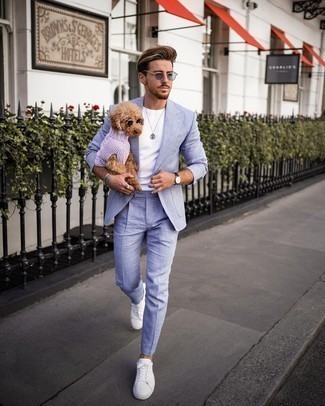 Light Blue Suit Outfits: Putting together a light blue suit and a white crew-neck t-shirt is a surefire way to infuse your styling arsenal with some manly elegance. Want to tone it down on the shoe front? Introduce white canvas low top sneakers to the equation for the day.