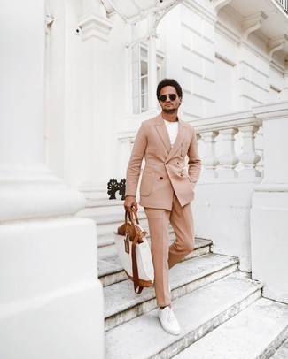 Tan Suit Warm Weather Outfits: A tan suit and a white crew-neck t-shirt are the kind of a foolproof combination that you so desperately need when you have no time. Not sure how to round off? Add a pair of white canvas low top sneakers to this ensemble for a more relaxed touch.