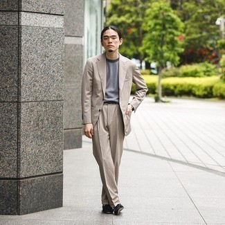 Tan Suit Outfits: A tan suit and a grey horizontal striped crew-neck t-shirt are worth adding to your list of wardrobe must-haves. Rounding off with black suede tassel loafers is a surefire way to introduce an extra dimension to your outfit.