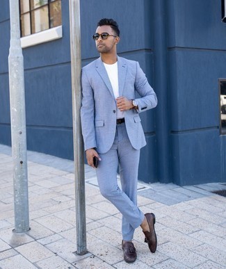 Light Blue Suit Outfits: A light blue suit and a white crew-neck t-shirt are appropriate for both smart casual situations and off-duty wear. In the shoe department, go for something on the smarter end of the spectrum by rocking dark brown leather tassel loafers.