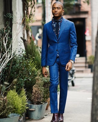 Navy Silk Scarf Outfits For Men: A blue suit and a navy silk scarf will inject your day-to-day arsenal this relaxed and dapper vibe. Burgundy leather chelsea boots are guaranteed to bring an added dose of polish to this getup.