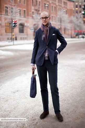 Purple Scarf Outfits For Men: Parade your skills in men's fashion by opting for this laid-back pairing of a navy suit and a purple scarf. You can get a bit experimental in the shoe department and introduce dark brown suede desert boots to your getup.