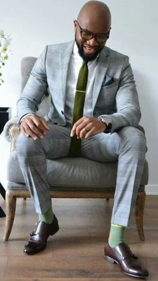 Olive Tie Outfits For Men: You can be sure you'll look smooth and smart in a grey plaid suit and an olive tie. Up your whole outfit with a pair of dark brown leather double monks.