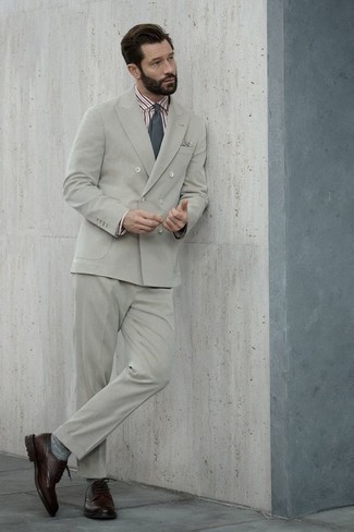 Grey Suit Outfits: Try pairing a grey suit with a multi colored vertical striped dress shirt for a classic and classy silhouette. To add an air of stylish casualness to this ensemble, add burgundy leather brogues to the equation.