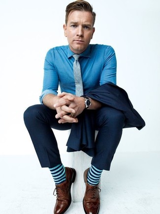 Mint Horizontal Striped Socks Outfits For Men: Teaming a navy suit with mint horizontal striped socks is a wonderful choice for a casual yet dapper getup. Got bored with this look? Introduce brown leather brogues to change things up a bit.