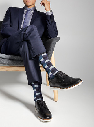 Navy Check Socks Outfits For Men: This laid-back combo of a navy suit and navy check socks is a tested option when you need to look nice but have zero time. Up the style factor of your look by finishing off with a pair of black leather brogues.