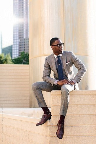 Burgundy Leather Brogues Outfits: Opt for a grey plaid suit and a white and navy dress shirt for a classic and elegant silhouette. Serve a little outfit-mixing magic by rocking a pair of burgundy leather brogues.