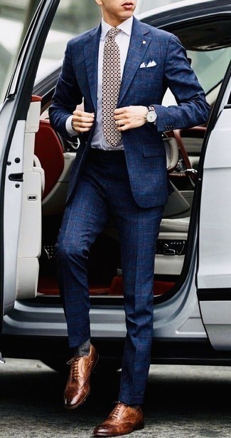 Tobacco Leather Brogues Outfits: This getup demonstrates that it is totally worth investing in such elegant menswear pieces as a navy plaid suit and a white dress shirt. And if you wish to immediately play down this ensemble with one single item, why not complement your look with tobacco leather brogues?