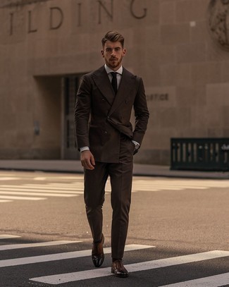 Brown Leather Brogues Outfits: Pairing a dark brown suit and a white dress shirt will prove your styling skills. For something more on the cool and casual side to finish off this outfit, complement this outfit with a pair of brown leather brogues.