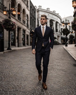 Brown Leather Brogues Outfits: A navy suit looks so classy when paired with a white dress shirt for an ensemble worthy of a contemporary gentleman. Play down the formality of this ensemble by rocking brown leather brogues.