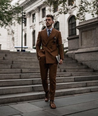 Brown Leather Brogues Outfits: Wear a brown suit with a light blue dress shirt if you're aiming for a neat, fashionable getup. Go the extra mile and switch up your getup with brown leather brogues.