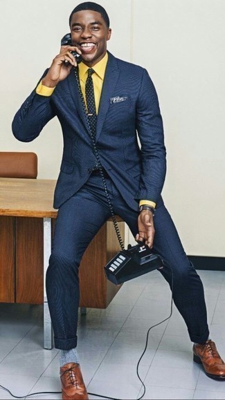 Mustard Dress Shirt Outfits For Men: Teaming a mustard dress shirt and a navy vertical striped suit is a surefire way to breathe personality into your daily wardrobe. And if you want to effortlessly play down your look with footwear, why not introduce a pair of brown leather brogues to your getup?
