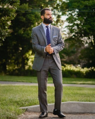 Navy and White Socks Outfits For Men: This combination of a grey plaid suit and navy and white socks is the ultimate laid-back style for today's guy. Bring a dash of class to your look by wearing black leather brogues.