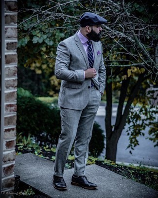 Navy Flat Cap Outfits For Men: Consider pairing a grey plaid wool suit with a navy flat cap for a kick-ass look. To introduce a bit of zing to this look, go for black leather brogues.