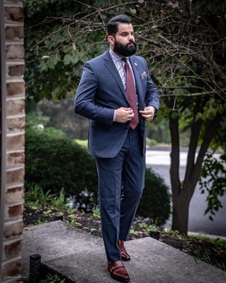 Blue Plaid Suit Outfits: We're loving how this combination of a blue plaid suit and a light violet gingham dress shirt immediately makes any man look classy and sharp. Add dark brown leather brogues to this outfit and you're all done and looking spectacular.
