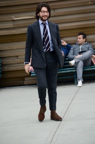 Grey Vertical Striped Suit Outfits: This pairing of a grey vertical striped suit and a light blue dress shirt is a tested option when you need to look like a maverick in the menswear department. If you want to effortlessly dress down your ensemble with a pair of shoes, why not complete your getup with a pair of dark brown suede casual boots?