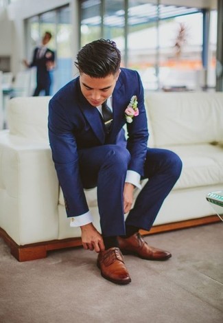 Brown Leather Derby Shoes Dressy Outfits: Dress for success in a blue suit and a white dress shirt. A pair of brown leather derby shoes will bring a laid-back vibe to your outfit.
