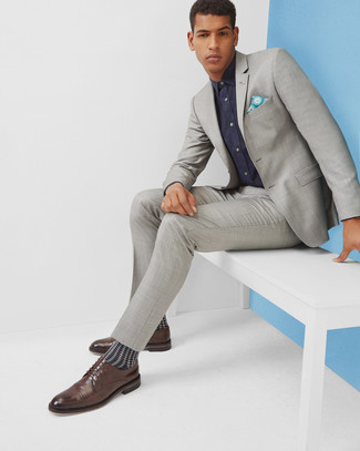 Light Blue Print Pocket Square Outfits: If you're in search of an off-duty but also dapper getup, consider teaming a grey suit with a light blue print pocket square. A pair of dark brown leather derby shoes immediately kicks up the style factor of this outfit.