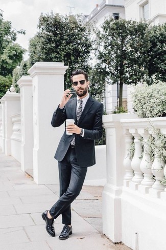 Black Print Tie Outfits For Men: This outfit demonstrates it is totally worth investing in such elegant menswear items as a charcoal suit and a black print tie. Our favorite of a multitude of ways to complete this outfit is with a pair of black leather derby shoes.