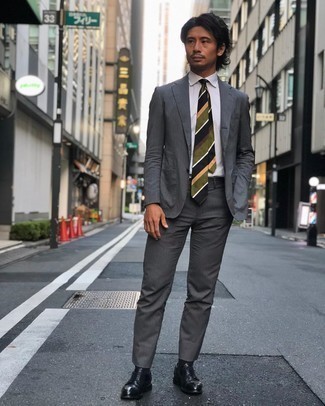 Dark Green Horizontal Striped Tie Outfits For Men: This is hard proof that a grey suit and a dark green horizontal striped tie look amazing when you pair them in an elegant look for a modern gent. To give this outfit a more casual aesthetic, introduce black leather derby shoes to the equation.