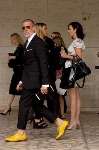 Nick Wooster wearing Black Suit, White Dress Shirt, Yellow Leather Derby Shoes, Black Tie