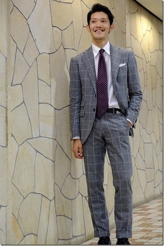 Light Violet Polka Dot Tie Outfits For Men: Pairing a grey check suit and a light violet polka dot tie is a surefire way to inject your styling arsenal with some rugged sophistication. Black leather derby shoes will add an easy-going touch to an otherwise dressy outfit.