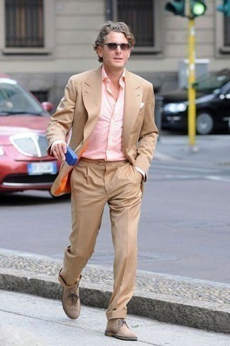 Beige Suede Desert Boots Outfits: Definitive proof that a tan suit and a pink dress shirt are amazing when married together in an elegant getup for a modern guy. Why not add beige suede desert boots to this ensemble for a more relaxed spin?