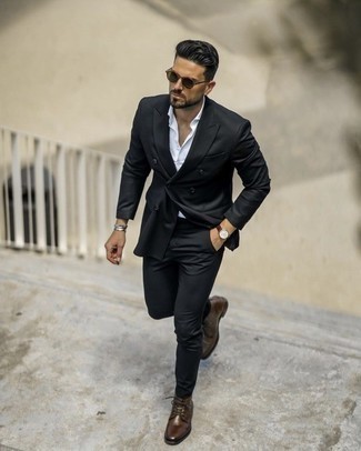 Brown Leather Watch Outfits For Men: For a never-failing off-duty option, you can't go wrong with this combination of a black suit and a brown leather watch. You can take a more elegant route with footwear by slipping into dark brown leather desert boots.