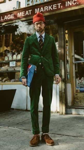 Dark Green Corduroy Suit Outfits: A dark green corduroy suit and a white dress shirt are a sophisticated look that every modern man should have in his closet. And if you need to effortlessly dial down your ensemble with one piece, add a pair of brown suede desert boots to your look.