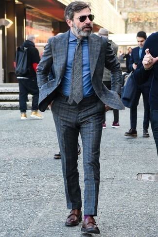 Charcoal Plaid Suit Outfits: Teaming a charcoal plaid suit with a blue denim dress shirt is an on-point idea for a sharp and polished getup. Add a pair of brown leather double monks to the mix and ta-da: this look is complete.