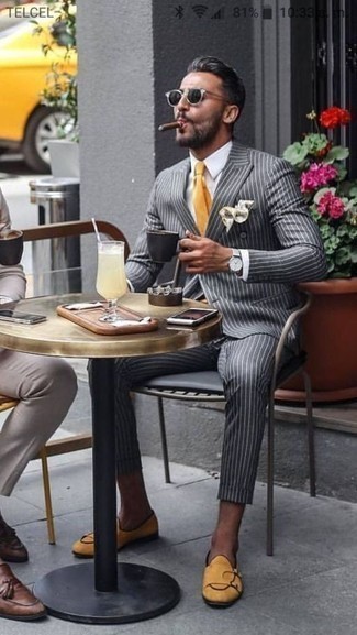 Tan Pocket Square Outfits: You'll be amazed at how easy it is for any guy to put together this off-duty look. Just a charcoal vertical striped suit and a tan pocket square. Puzzled as to how to finish your look? Rock mustard leather double monks to amp it up a notch.