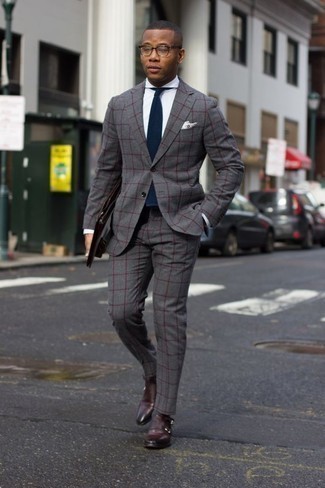 Grey Check Suit Outfits: Make a grey check suit and a white dress shirt your outfit choice and you'll ooze elegance and polish. Let your sartorial savvy really shine by finishing this outfit with burgundy leather double monks.