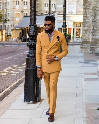 Mustard Pocket Square Outfits: A mustard suit and a mustard pocket square worn together are a match made in heaven for men who love cool and relaxed styles. Make your ensemble slightly more sophisticated by rounding off with a pair of burgundy leather double monks.