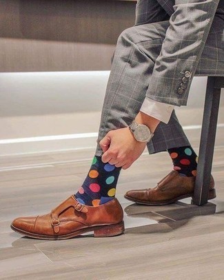 Navy and White Polka Dot Socks Outfits For Men: If you're on the lookout for a casual but also on-trend look, consider wearing a grey check suit and navy and white polka dot socks. If you want to immediately perk up your look with footwear, why not introduce a pair of tobacco leather double monks to the equation?