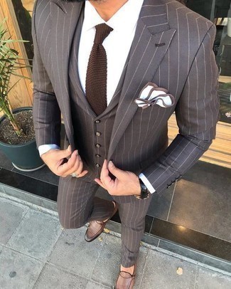 White and Brown Pocket Square Outfits: Such items as a dark brown vertical striped suit and a white and brown pocket square are an easy way to inject some cool into your daily casual wardrobe. When it comes to shoes, go for something on the more elegant end of the spectrum with a pair of brown leather double monks.